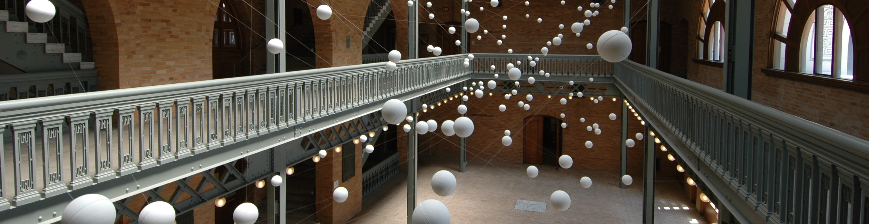 Foam balls suspended in the atrium of Hearst Memorial Mining Building in an art installation by J. Ignacio Diaz de Rabago